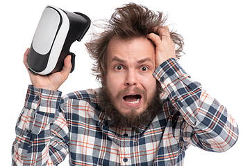 Image showing Crazy bearded man with VR goggles