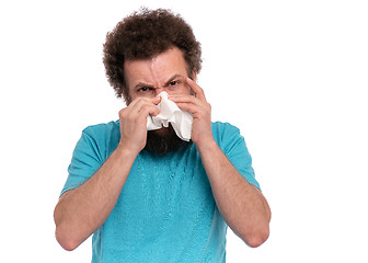 Image showing Crazy bearded man has runny nose