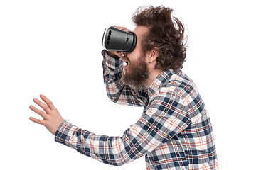 Image showing Crazy bearded man with VR goggles