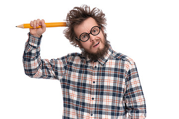 Image showing Crazy bearded man with big pencil