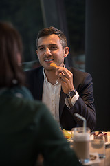 Image showing Couple on a romantic dinner at the restaurant