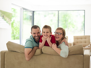 Image showing family with little boy enjoys in the modern living room