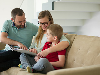 Image showing family with little boy enjoys in the modern living room