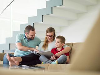 Image showing family with little boy enjoys in the modern living room