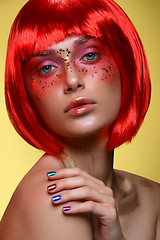 Image showing Beautiful girl in red wig