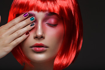 Image showing Beautiful girl in red wig