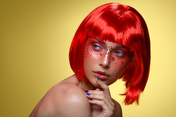 Image showing Beautiful girl in red wig