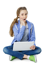 Image showing Teen age girl with tablet