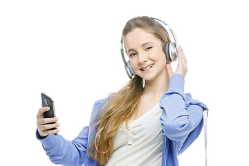 Image showing Teen age girl with headphones