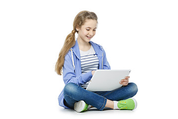 Image showing Teen age girl with tablet