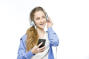 Image showing Teen age girl with headphones