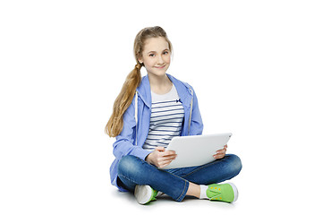 Image showing Teen age girl with tablet