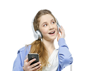 Image showing Teen age girl with headphones