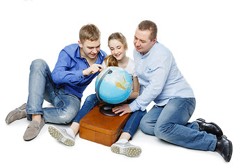 Image showing father with children looking at earth globe