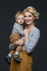 Image showing Beautiful young woman with toddler