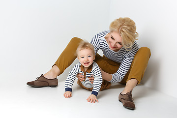 Image showing Beautiful young woman with toddler