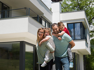 Image showing happy family with children in the yard