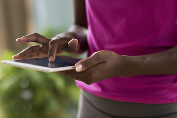 Image showing african american woman using tablet