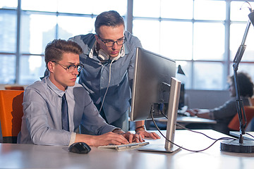 Image showing Two Business People Working With computer in office