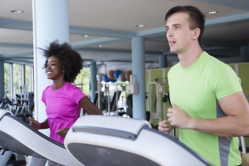 Image showing people exercisinng a cardio on treadmill in gym