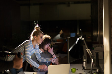 Image showing young designers in the night office