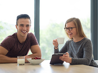 Image showing couple enjoying morning coffee and strawberries