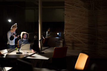 Image showing young designers in the night office