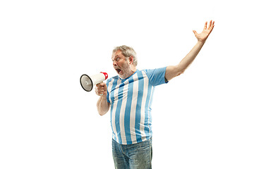 Image showing The Argentinean soccer fan celebrating on white background