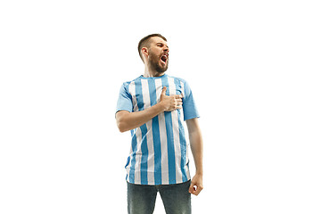 Image showing The soccer Argentinean fan celebrating on white background