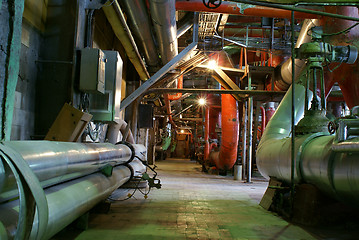 Image showing Pipes, tubes, machinery and steam turbine at a power plant