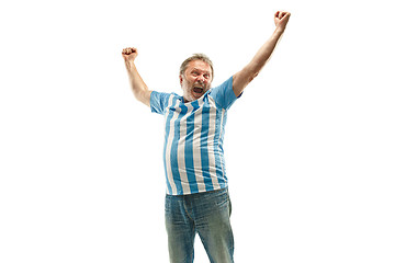 Image showing The Argentinean soccer fan celebrating on white background