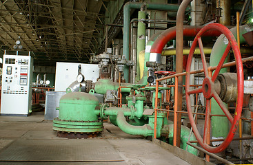 Image showing Pipes, tubes, machinery and steam turbine at a power plant