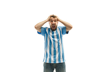 Image showing The unhappy and sad Argentinean fan on white background