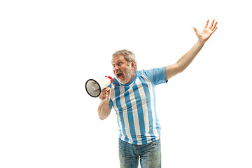 Image showing The Argentinean soccer fan celebrating on white background