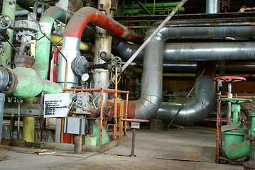 Image showing Pipes, tubes, machinery and steam turbine at a power plant