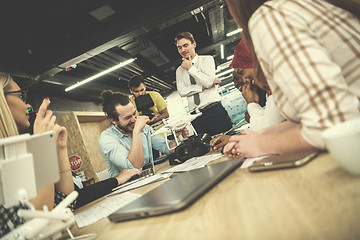 Image showing multiethnic business team learning about drone technology