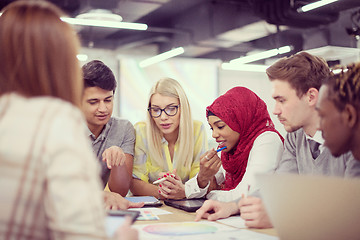 Image showing Multiethnic startup business team having meeting