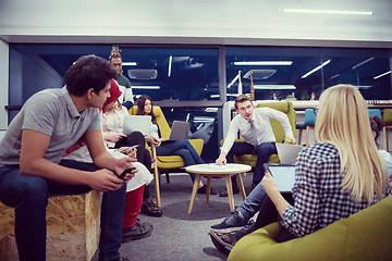 Image showing Multiethnic startup business team having meeting