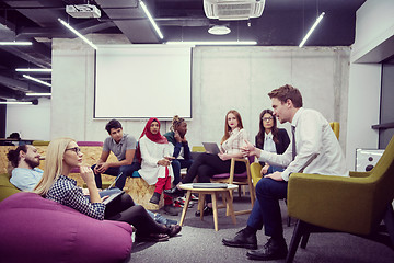 Image showing Multiethnic startup business team having meeting