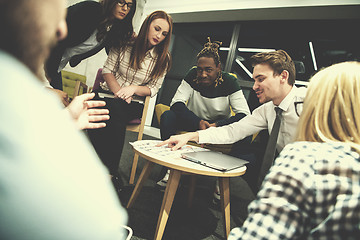 Image showing Multiethnic startup business team having meeting