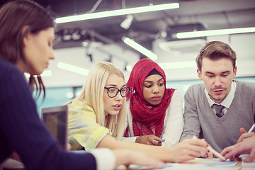 Image showing Multiethnic startup business team having meeting