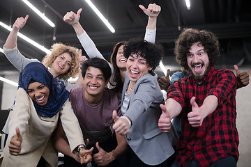 Image showing portrait of young excited multiethnics business team