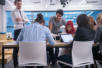 Image showing multiethnic business team learning about drone technology