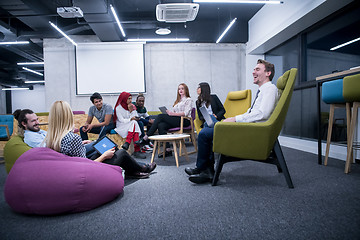 Image showing Multiethnic startup business team having meeting