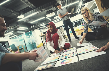 Image showing black muslim woman having meeting with Multiethnic  startup busi