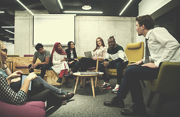 Image showing Multiethnic startup business team having meeting