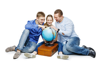 Image showing father with children looking at earth globe