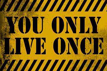 Image showing You only live once sign yellow with stripes