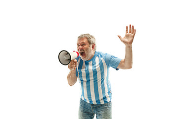 Image showing The Argentinean soccer fan celebrating on white background