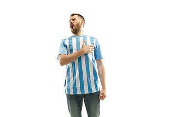 Image showing The soccer Argentinean fan celebrating on white background